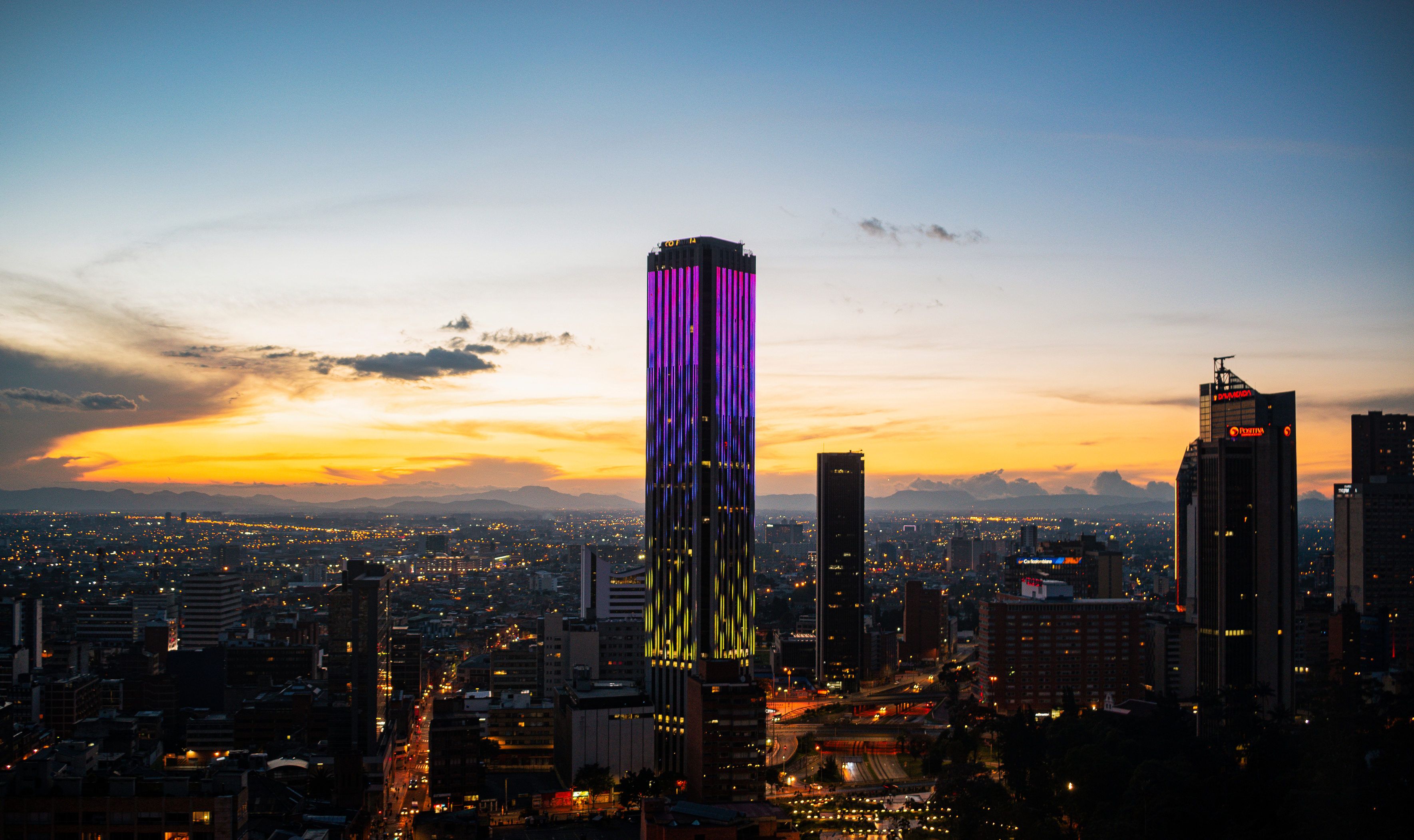 An Aerial Shot of Colpatria Tower During Sunset